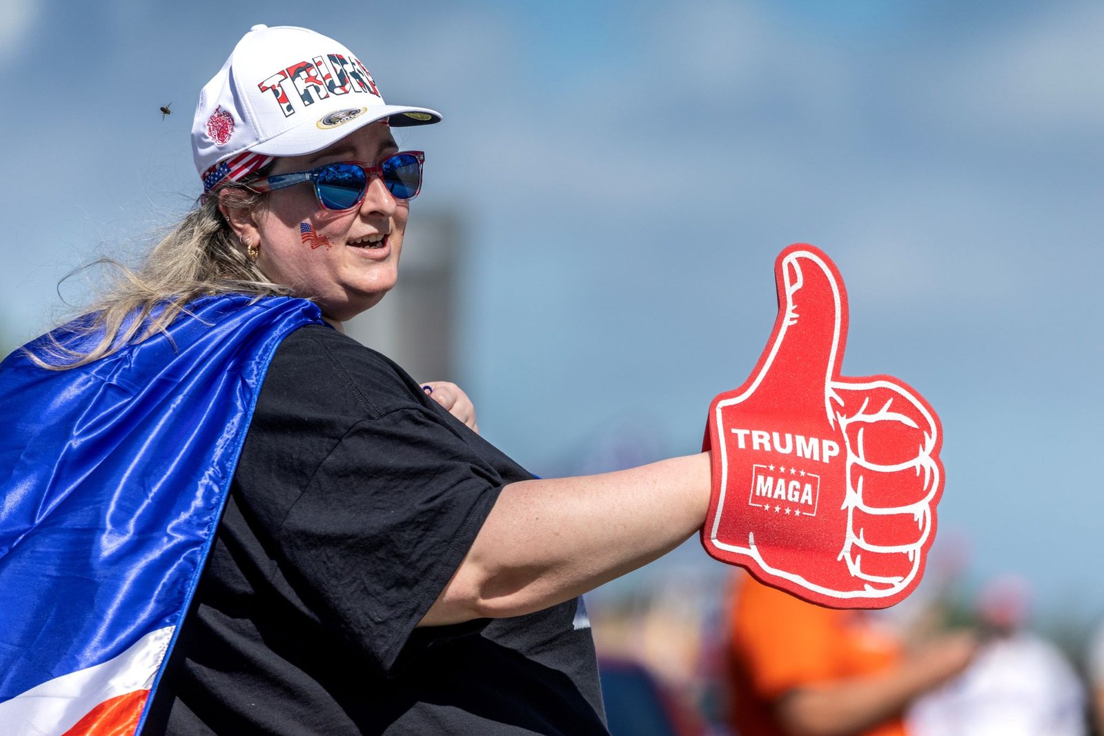 Apoiadora de Trump durante carreata. Crédito: EPA, Cristobal Herrera-Ulashkevich