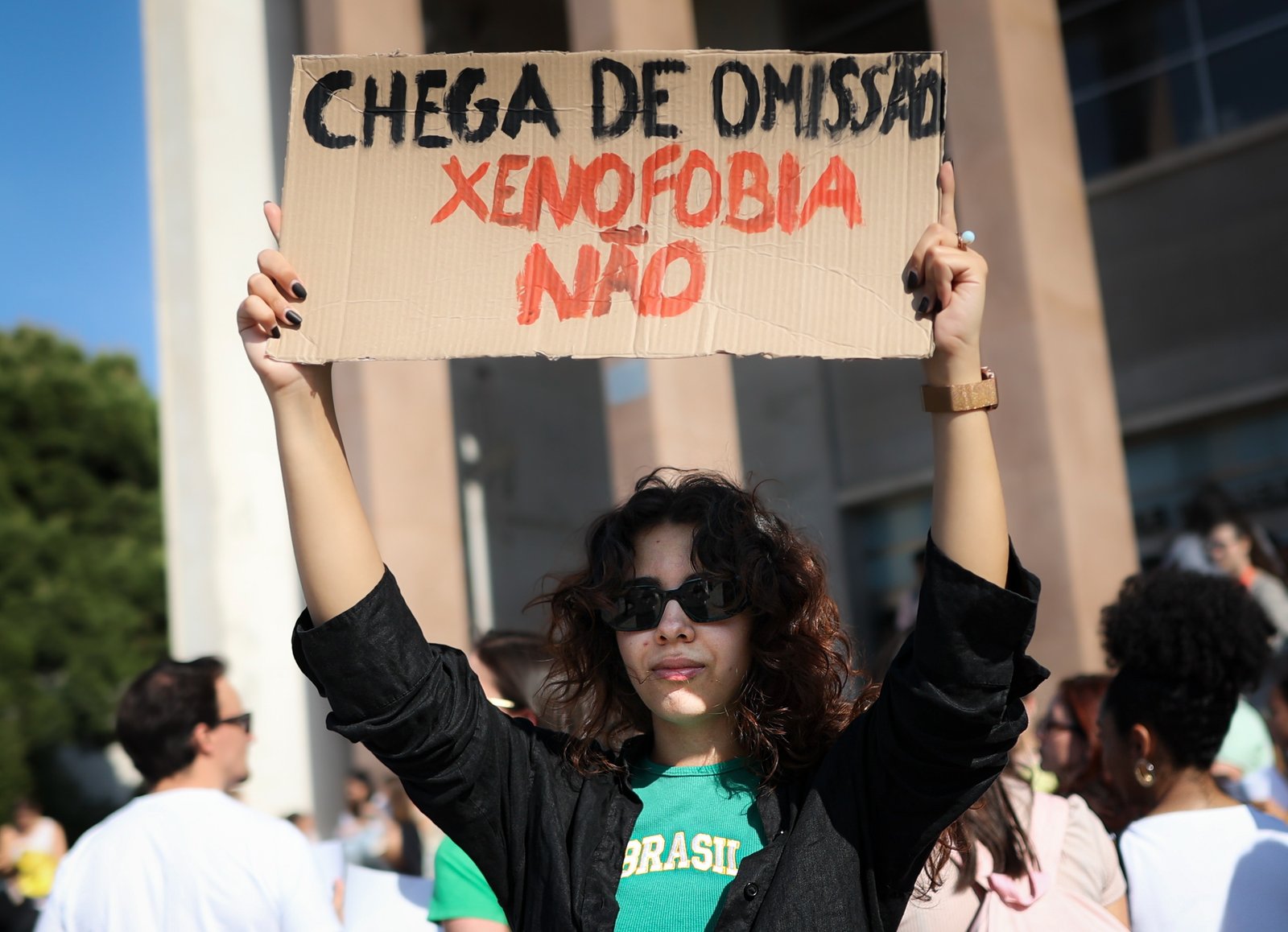 (Arquivo) Estudante brasileira protesta contra xenofobia. Crédito: Filipe Amorim, Agência Lusa.